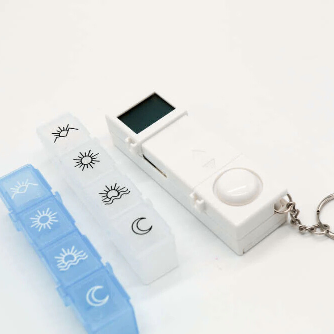 Daily medication reminder pill box